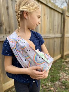 This is a sling for a doll...Your little girl will feel like a mommy wearing her baby. We can make them to fit a child up to 6 years old. Can be ordered with or without the child's name on the strap. See font choices in photo. We welcome custom orders! Baby Doll Carrier, Doll Carrier, Big Sister Gifts, Baby Doll Accessories, Butterfly Baby, Doll Stuff, Child Doll, Rainbow Baby, Big Sister