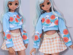 two pictures of a doll wearing a blue sweater with flowers on the front and back