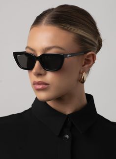 SLIM ROUNDED CATEYE SUNGLASSES IN BLACK PRODUCT DETAILS Frame Shape: Rounded Cateye Frame Color: Shiny Black Lens Color: Smoke, Lens Category 3 100% UV Protection Comes with a Protective Vegan Pouch SIZE MM INCHES FRAME WIDTH 145.3MM 5.7" FRAME HEIGHT 43.5MM 1.6" NOSE GAP 22MM 2" Black Sunglasses Outfit, Vogue Sunglasses, Sunglasses Outfit, Cateye Sunglasses, Mirrored Sunglasses Women, Rich Girl, Black Sunglasses, Cat Eye Sunglasses, Cat Eye