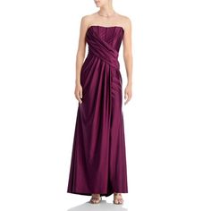 a woman in a long purple dress