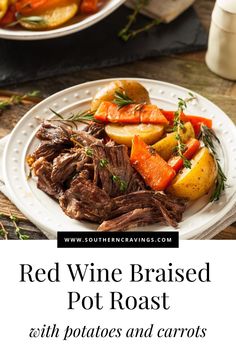 red wine braised pot roast with potatoes and carrots on a white platter