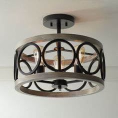 a light fixture hanging from the ceiling in a room