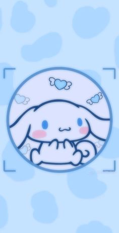 an image of a cute little bunny on a blue polka dot background with hearts in the sky