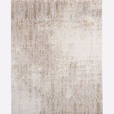 a beige and white rug with an abstract design