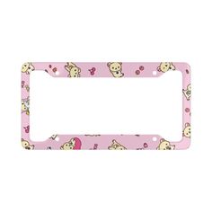 a pink license plate holder with cartoon characters on the front and bottom, along with hearts