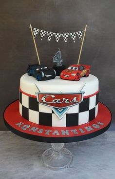 a birthday cake with cars on it