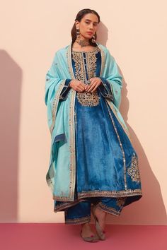 Buy Blue Velvet Embroidered Zardozi Round Choga Set For Women by Angad Singh Online at Aza Fashions. Blue Velvet Suit, Velvet Suit Design, Mirror Detail, Traditional Attires, Blue Kurta, Indian Wedding Wear, Indian Bridal Outfits, Indian Fashion Designers, Indian Designer Outfits