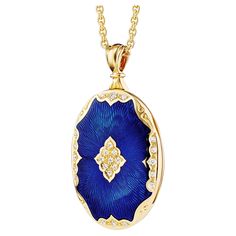 Victor Mayer oval locket pendant 18k yellow gold, electric blue vitreous enamel, 25 diamonds, total 0.19 ct, measurements app. 25.0 mm x 36.0 mm About the creator Victor Mayer Victor Mayer is internationally renowned for elegant timeless designs and unrivalled expertise in historic craftsmanship. Lovers of the extraordinary appreciate the beauty of Victor Mayer's designs, which use extremely rare techniques such as genuine enamel or elaborate engravings. Since 1890, the company has stood for the Diamond Locket, Vitreous Enamel, Oval Locket, Locket Pendant Necklace, Blue Pin, Modern Necklaces, French Antique, Antique Diamond, Modern Pendant