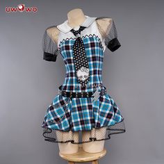 a mannequin wearing a blue and black plaid dress