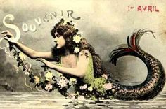 a woman in a green dress is holding a flower and a large dragon like creature