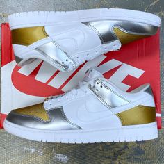 Selling A Pair Of Deadstock Nike Wmns Dunk Low Se Silver Gold Metallic Shoes! Good / White - Silver Women’s 11.5 / Men’s Us 10 / Uk9 / Eu 43 Nike Id Dh4403-700 Please Check Size Before Purchasing. Click Add To Bundlebelow To Receive An Offer! Combine Items And Save On Shipping! Nike Metallic Sneakers For Streetwear, Nike Gold High-top Custom Sneakers, Nike Custom Gold Round Toe Sneakers, Gold Nike Custom Low-top Sneakers, Nike Custom Gold Sneakers, Silver Custom Sneakers With Boost Midsole, Silver Custom Sneakers With Boost Midsole For Sports, Nike Metallic Sneakers For Sports, Silver Sneakers With Metallic Logo For Streetwear