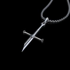 Embrace the indomitable spirit with our Broken Sword Pendant. Crafted to reflect an ancient warrior's resilience, this meticulously broken and silver-plated pendant symbolizes the fierce battles of yore. Perfectly balancing elegance and masculinity, it's suitable for both everyday wear and special occasions. Each piece tells a story of valor, making it a profound gift or a meaningful personal keepsake. Chain Length: 60cm Pendant Size: 3cm Manually Maded Made from premium-quality steel We ship wo Witch Rings, Vikings Gifts, Cosplay Jewelry, Celtic Necklace, Warrior Spirit, Viking Jewelry, Color Plata, Bronze Color, Chain Pendants