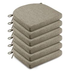 six pillows stacked on top of each other