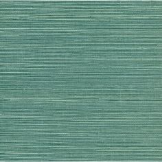 a green rug with vertical stripes on it