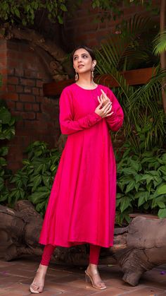 Bring on the festive spirit with our Anarkali kurta in chanderi silk. Separate A line Butter Crepe sleeveless inner. Chudidar Sleeves. Made in chanderi silk. Bandhani Dupatta in Modal Silk with Lagdi patta. Color of Kurta + Slip : Rani Pink. Color of Dupatta : Blue. Dupatta Length : 2.5 mtrs | Dupatta Width : 45" Model height is 5.3” and is wearing a size S. Wash Care : Dry Clean Only. Sequins Blouse, Bandhani Dupatta, Blue Dupatta, Silk Anarkali, Black Lehenga, Rani Pink, Anarkali Kurta, Pakistani Outfits, Anarkali