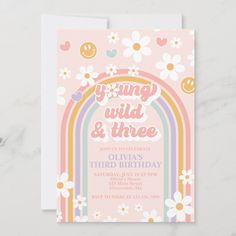 a birthday card with the words young and three on it in rainbows, daisies,