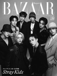 black and white photo of group of young men in suits with hats on their heads