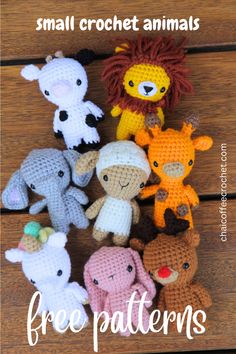 small crochet animals sitting on top of a wooden table