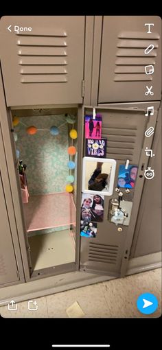 an open locker with pictures and magnets on it