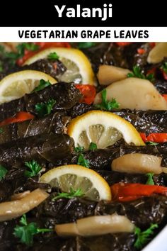 Yalanji (Vegetarian Grape Leaves). Rolled grape leaves stuffed with vegetable rice filling. Cooked in a tangy lemon sauce. Easy Vegan Appetizers, Vegan Mediterranean, Vegan Appetizers Recipes