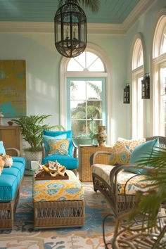 a living room filled with lots of furniture next to a large potted palm tree