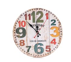 a wooden clock with numbers on the front and back of it's face in different colors