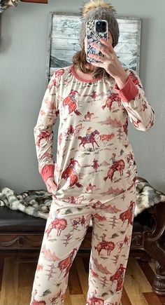 Bucking Broncs, Roping Steers, Steer WrestingThe perfect Retro Cowboy/ Cowgirl PJs! This retro print is too much!  This is our best, most flattering fit ever! For Every body!   ❄️  I am wearing a medium.  Razels Exclusive!! Designed by Razels ⚡ MATCHING KIDS ALSO AVAILABLE IN SIZES 3-6 months - 14/16⚡ Machine washable and dryable! 🧺  95% Cotton, 5% Spandex.  More Razels! Cowboy Christmas Pajamas, Cowgirl Pjs, Western Family, Vintage Cowboys, Cowboy Print, Retro Cowboy, Family Pjs, Unisex Pajamas, Comfy Pjs