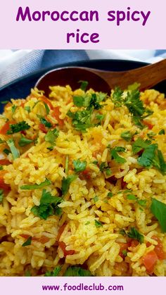 a close up of a plate of rice with parsley on top and the words moroccan spicy rice above it