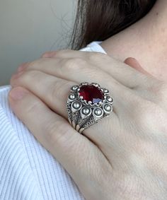 Ruby Gemstone Silver Gothic Filigree Ring, 925 Sterling Silver Handmade Ornate Bold Cocktail Ring Jewelry, Ring Gift for Sister Her Red gemstone ring, oval goth gift ring, daisy petals ring, filigree jewelry, birthday gift her, wedding gift ring Material: 925 Sterling Silver ( NICKEL FREE ) Gemstone: Ruby Quartz 10x12 mm. -The Ruby Gemstone Silver Gothic Filigree Ring is an exquisite fusion of boldness and sophistication. Handcrafted from 925 sterling silver, its intricate Gothic filigree design Sterling Silver Rings With Intricate Design, Silver Filigree Ring With Stone Setting, Artisan Sterling Silver Rings With Intricate Design, Unique Ruby Ring In Sterling Silver, Unique Ruby Ring In Sterling Silver Stamped 925, Silver Sterling Filigree Ring With Stone Setting, Ornate Sterling Silver Filigree Ring With Stone Setting, Ruby Filigree Ring As Gift, Red Sterling Silver Rings With Intricate Design