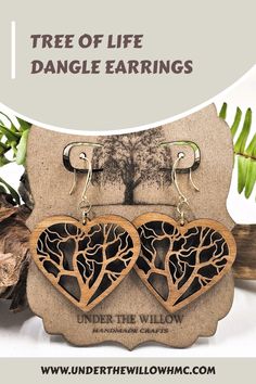 Tree of Life dangle earrings on a decorative card with wooden and metal design. Wood Dangle Earrings, Cutout Design, Heart Dangle Earrings, Eco Friendly Jewelry, A Heart, Handmade Earrings, Tree Of Life, Handmade Crafts, Sale Items