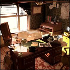 an old fashioned desk in the corner of a room filled with papers and other items