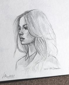 a pencil drawing of a woman's face