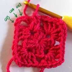 the crochet square is being worked on