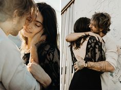 a man and woman hugging each other in front of a wall with graffiti on it