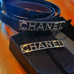 Chanel Logo Belt. Comes With Interchangeable Pieces, Matte Leather And Patent Leather Belt. Plain Metal Buckle And Buckle With Rhinestones, The Metal Around The Rhinestone Buckle Has Oxidized From Age. Size 85, Never Got To Wear Too Big Didn't For Me. Authentic And Very Rare Piece. Comes With Dust Bag And Box. Chanel Logo, Chanel Accessories, Metal Buckles, Very Rare, Leather Belt, Patent Leather, Black Silver, Dust Bag, Chanel