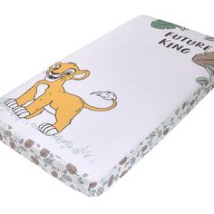 a baby crib mattress with a cartoon lion on it's front and sides