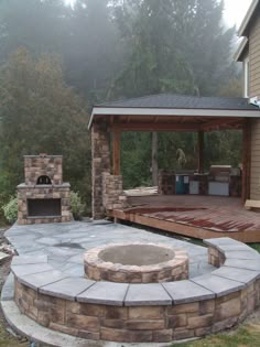 a fire pit sitting in the middle of a yard