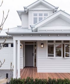 the instagram app is open and shows an image of a white house with wood floors