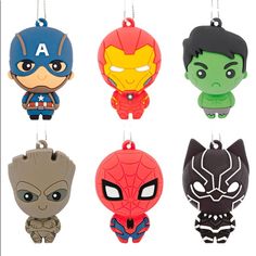 the avengers ornament ornaments are hanging from strings and have different designs on them