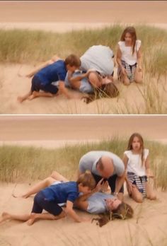 three people are sitting in the sand and one person is laying down on the ground