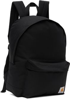 Water-repellent recycled polyester canvas backpack in black. · Webbing carry handle · Adjustable padded shoulder straps · Zip pocket and logo patch at face · Padded mesh back face · Cordura® canvas base · Two-way zip closure · Zip pocket at interior · Padded laptop compartment · Canvas lining · H17 x W11.5 x D5.5 / 18.4L Supplier color: Black Black Everyday Bags With Logo Patch, Everyday Black Bags With Logo Patch, Nylon Backpack With Logo Patch For Streetwear, Nylon Backpack With Logo Patch, Black Standard Backpack With Logo Patch, Streetwear Backpack With Logo Patch, Black Backpack With Logo Patch, Black School Backpack With Logo Patch, Functional Everyday Backpack With Logo Patch