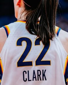 the back of a female basketball player's jersey that says 22 clark