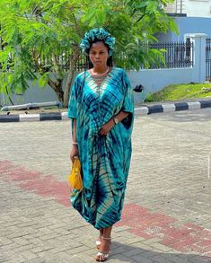 🎈This Adire silk Kaftan dress is made of high quality adire silk (Nigerian tie dye) that feels good on the skin. Look simple, yet sophisticated enough to steal all the attention. Great African Summer Boubou outfit. 🎈Details - Custom made from scratch -Loose Fit : You can provide your measurements / I'll make according to the measurements of the size you choose Sleeve: Short Sleeve - Neckline: V-Neck ; has rope at the neck -Dress Length 55 inches ( It can be made shorter if you want or accordin Long Green Batik Print Dress, Green Long Batik Print Dress, Silk Kaftan Dress, Nigerian Women, Women Party Dress, Dress Ankara, Silk Kaftan, African Queen, Silk Tunic