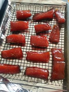 there are several pieces of food on the tray ready to be cooked and put in the oven