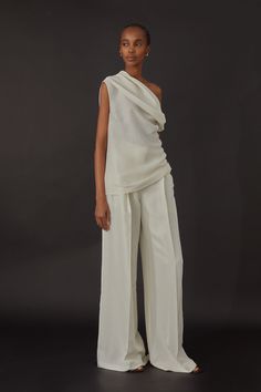 Wide-leg, pleat tailored trousers in Italian silk shantung fabric. Details include interior waistband curtain, belt loops and slash pockets. Fully lined in silk habotai. Wear it with Frida Top, Isabel Top or Luisa Blazer in the same fabric. Feminine Silhouette Fashion, White Silk Trousers, Wrapped Trousers, White Trousers Outfit Casual, Shirt And Trousers Women, Neoclassical Fashion, Summer Tailoring, White Trousers Outfit, White Matching Set