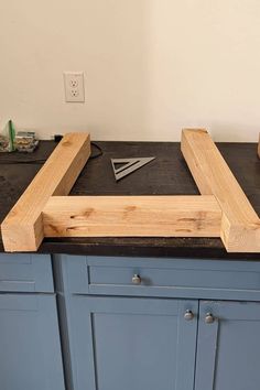 a kitchen counter that has some tools on it