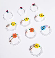 Cheap Colorful Beaded Flower Ring As Gift, Adjustable Beaded Flower Ring Gift, Beaded Flower Ring With Round Beads As A Gift, Adjustable Multicolor Flower Ring With Beads, Flower Beaded Ring, String Rings, Cheap Flower-shaped Rings With Colorful Beads, Ring Photoshoot, Rings Beaded