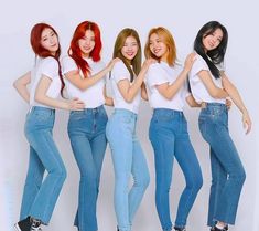 the girls are posing in jeans and t - shirts