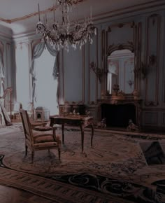 an ornately decorated living room with chandelier