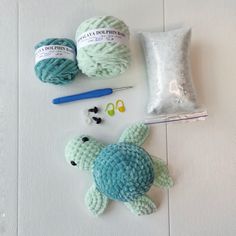 crochet items including yarn, scissors and sea turtle